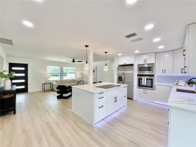 Welcome to your dream home in the heart of Dunedin, one of on The Dunedin Country Club in Florida - for sale on GolfHomes.com, golf home, golf lot