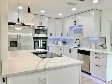 Welcome to your dream home in the heart of Dunedin, one of on The Dunedin Country Club in Florida - for sale on GolfHomes.com, golf home, golf lot