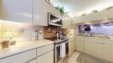 Charming and impeccably maintained 2-bedroom, 2-bath townhouse on Jim McLean Signature Course in Florida - for sale on GolfHomes.com, golf home, golf lot