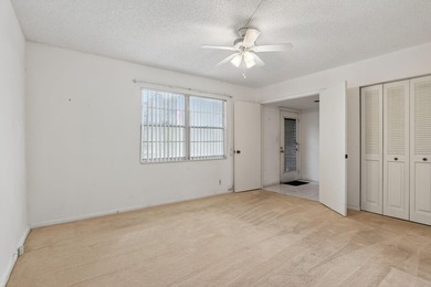 REDUCED TO SELL. LOCATION, LOCATION, LOCATION IS STILL AN on Wynmoor Golf Course in Florida - for sale on GolfHomes.com, golf home, golf lot