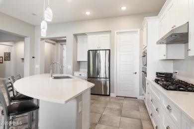 This impeccably maintained residence boasts sophisticated on Tuscany Falls At Pebble Creek in Arizona - for sale on GolfHomes.com, golf home, golf lot
