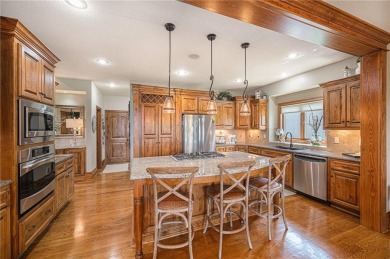Welcome to this immaculate custom reverse 1.5-story home located on Staley Farms Golf Club in Missouri - for sale on GolfHomes.com, golf home, golf lot