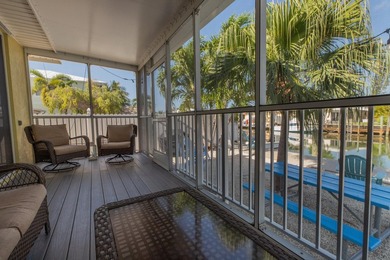 This charming 3-bedroom, 2-bath half-duplex has so much to on Key Colony Beach Golf Course in Florida - for sale on GolfHomes.com, golf home, golf lot