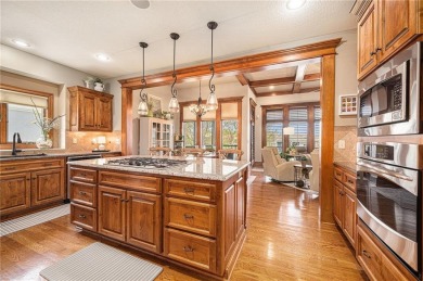 Welcome to this immaculate custom reverse 1.5-story home located on Staley Farms Golf Club in Missouri - for sale on GolfHomes.com, golf home, golf lot
