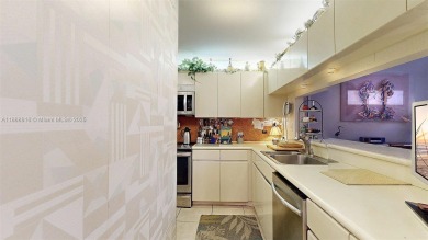 Charming and impeccably maintained 2-bedroom, 2-bath townhouse on Jim McLean Signature Course in Florida - for sale on GolfHomes.com, golf home, golf lot