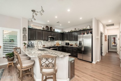 From gorgeous curb appeal to a resort-like pool backyard,this on Corte Bella Golf Club in Arizona - for sale on GolfHomes.com, golf home, golf lot
