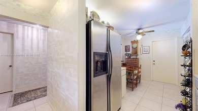 Charming and impeccably maintained 2-bedroom, 2-bath townhouse on Jim McLean Signature Course in Florida - for sale on GolfHomes.com, golf home, golf lot