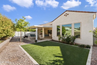 This impeccably maintained residence boasts sophisticated on Tuscany Falls At Pebble Creek in Arizona - for sale on GolfHomes.com, golf home, golf lot