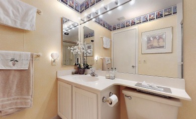 Charming and impeccably maintained 2-bedroom, 2-bath townhouse on Jim McLean Signature Course in Florida - for sale on GolfHomes.com, golf home, golf lot