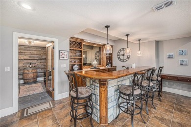 Welcome to this immaculate custom reverse 1.5-story home located on Staley Farms Golf Club in Missouri - for sale on GolfHomes.com, golf home, golf lot