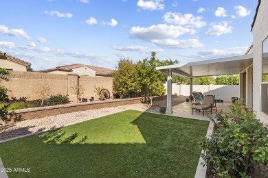 This impeccably maintained residence boasts sophisticated on Tuscany Falls At Pebble Creek in Arizona - for sale on GolfHomes.com, golf home, golf lot