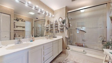 Charming and impeccably maintained 2-bedroom, 2-bath townhouse on Jim McLean Signature Course in Florida - for sale on GolfHomes.com, golf home, golf lot