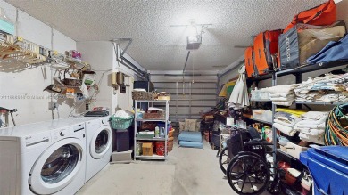 Charming and impeccably maintained 2-bedroom, 2-bath townhouse on Jim McLean Signature Course in Florida - for sale on GolfHomes.com, golf home, golf lot