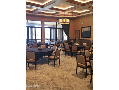 This impeccably maintained residence boasts sophisticated on Tuscany Falls At Pebble Creek in Arizona - for sale on GolfHomes.com, golf home, golf lot