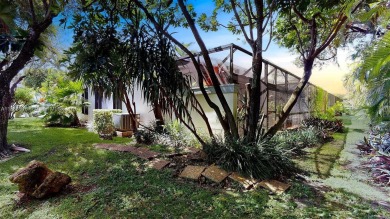 Charming and impeccably maintained 2-bedroom, 2-bath townhouse on Jim McLean Signature Course in Florida - for sale on GolfHomes.com, golf home, golf lot