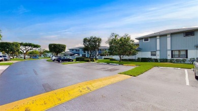 Charming and impeccably maintained 2-bedroom, 2-bath townhouse on Jim McLean Signature Course in Florida - for sale on GolfHomes.com, golf home, golf lot