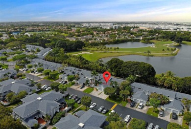 Charming and impeccably maintained 2-bedroom, 2-bath townhouse on Jim McLean Signature Course in Florida - for sale on GolfHomes.com, golf home, golf lot