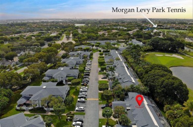 Charming and impeccably maintained 2-bedroom, 2-bath townhouse on Jim McLean Signature Course in Florida - for sale on GolfHomes.com, golf home, golf lot