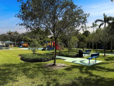 Charming and impeccably maintained 2-bedroom, 2-bath townhouse on Jim McLean Signature Course in Florida - for sale on GolfHomes.com, golf home, golf lot