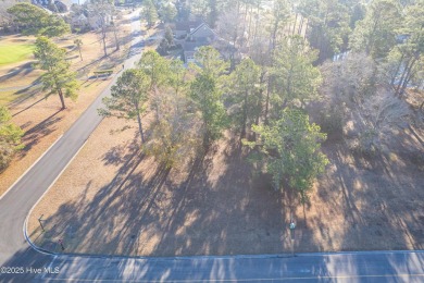 Measuring almost 1/2 acres is this affordable corner lot in on Brunswick Plantation and Golf Resorts in North Carolina - for sale on GolfHomes.com, golf home, golf lot