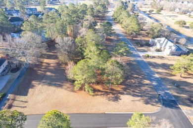 Measuring almost 1/2 acres is this affordable corner lot in on Brunswick Plantation and Golf Resorts in North Carolina - for sale on GolfHomes.com, golf home, golf lot