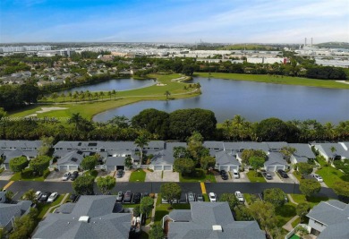 Charming and impeccably maintained 2-bedroom, 2-bath townhouse on Jim McLean Signature Course in Florida - for sale on GolfHomes.com, golf home, golf lot