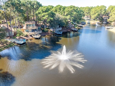Perfectly positioned along the central lake in the coveted on Sandestin Golf and Beach Resort - The Links in Florida - for sale on GolfHomes.com, golf home, golf lot