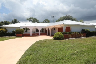 Welcome to 1436 SE Sunshine Ave, located in the highly desirable on Santa Lucia River Club in Florida - for sale on GolfHomes.com, golf home, golf lot
