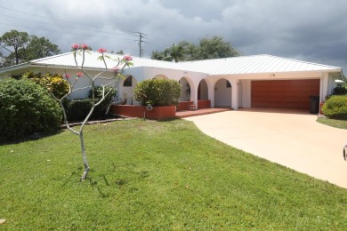 Welcome to 1436 SE Sunshine Ave, located in the highly desirable on Santa Lucia River Club in Florida - for sale on GolfHomes.com, golf home, golf lot