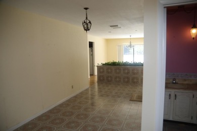 Welcome to 1436 SE Sunshine Ave, located in the highly desirable on Santa Lucia River Club in Florida - for sale on GolfHomes.com, golf home, golf lot