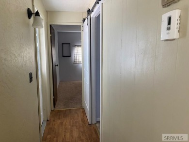 Charming, well-kept home on a nicely landscaped lot in Challis on Challis Golf Course in Idaho - for sale on GolfHomes.com, golf home, golf lot