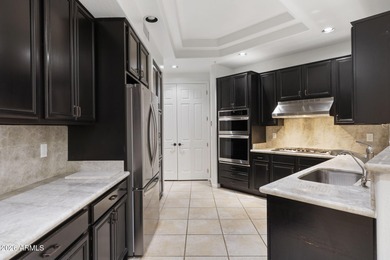 Rarely available & beautifully updated townhome in the guard on Grayhawk Golf Club  in Arizona - for sale on GolfHomes.com, golf home, golf lot