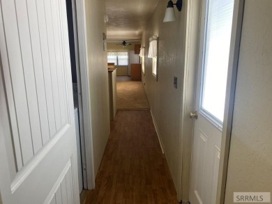 Charming, well-kept home on a nicely landscaped lot in Challis on Challis Golf Course in Idaho - for sale on GolfHomes.com, golf home, golf lot