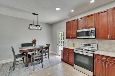 Absolutely gorgeous pool home overlooking a serene pond in the on River Hills Country Club in Florida - for sale on GolfHomes.com, golf home, golf lot