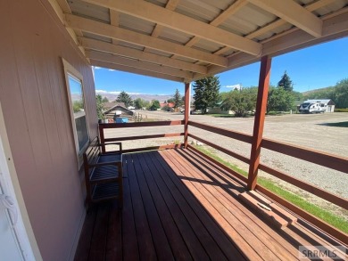 Charming, well-kept home on a nicely landscaped lot in Challis on Challis Golf Course in Idaho - for sale on GolfHomes.com, golf home, golf lot