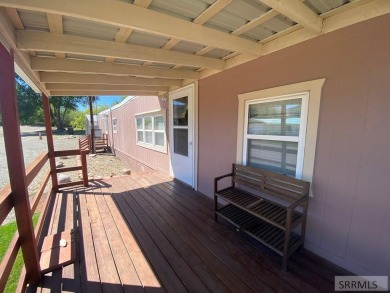 Charming, well-kept home on a nicely landscaped lot in Challis on Challis Golf Course in Idaho - for sale on GolfHomes.com, golf home, golf lot