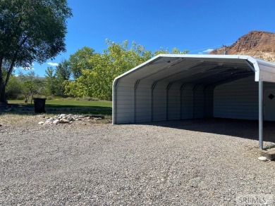 Charming, well-kept home on a nicely landscaped lot in Challis on Challis Golf Course in Idaho - for sale on GolfHomes.com, golf home, golf lot