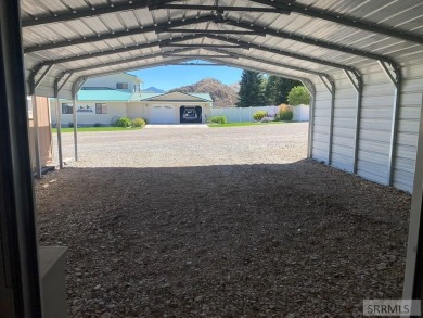 Charming, well-kept home on a nicely landscaped lot in Challis on Challis Golf Course in Idaho - for sale on GolfHomes.com, golf home, golf lot