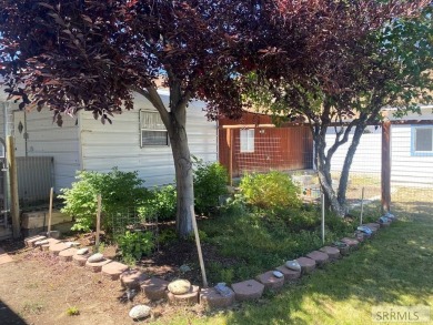 Charming, well-kept home on a nicely landscaped lot in Challis on Challis Golf Course in Idaho - for sale on GolfHomes.com, golf home, golf lot