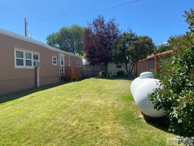 Charming, well-kept home on a nicely landscaped lot in Challis on Challis Golf Course in Idaho - for sale on GolfHomes.com, golf home, golf lot