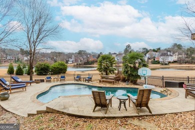 Lakefront living in sought after Hamilton Mill, priced to sell! on Hamilton Mill Golf Club in Georgia - for sale on GolfHomes.com, golf home, golf lot