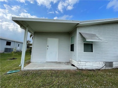 Wonderful home with upgrades & golf cart. NO popcorn ceilings on Indianwood Golf and Country Club in Florida - for sale on GolfHomes.com, golf home, golf lot