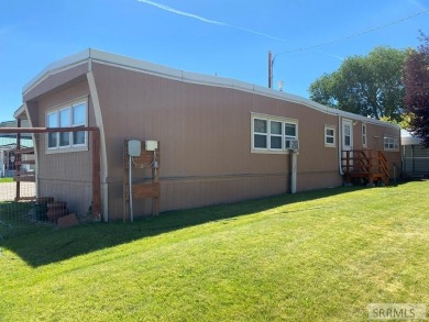 Charming, well-kept home on a nicely landscaped lot in Challis on Challis Golf Course in Idaho - for sale on GolfHomes.com, golf home, golf lot