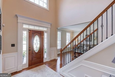 Lakefront living in sought after Hamilton Mill, priced to sell! on Hamilton Mill Golf Club in Georgia - for sale on GolfHomes.com, golf home, golf lot