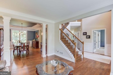 Lakefront living in sought after Hamilton Mill, priced to sell! on Hamilton Mill Golf Club in Georgia - for sale on GolfHomes.com, golf home, golf lot