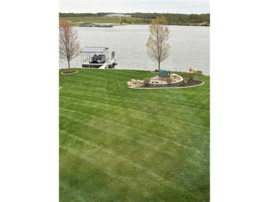 Lakefront Luxury Living in Creekmoor. Every morning feels like a on Golf Club of Creekmoor in Missouri - for sale on GolfHomes.com, golf home, golf lot