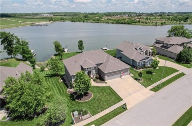 Lakefront Luxury Living in Creekmoor. Every morning feels like a on Golf Club of Creekmoor in Missouri - for sale on GolfHomes.com, golf home, golf lot