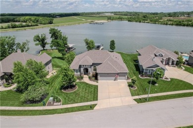 Lakefront Luxury Living in Creekmoor. Every morning feels like a on Golf Club of Creekmoor in Missouri - for sale on GolfHomes.com, golf home, golf lot