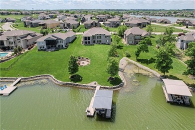 Lakefront Luxury Living in Creekmoor. Every morning feels like a on Golf Club of Creekmoor in Missouri - for sale on GolfHomes.com, golf home, golf lot