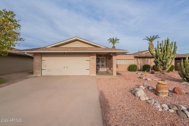 This updated and beautiful 3-bedroom home is move in ready with on Sun City Lakes West and East in Arizona - for sale on GolfHomes.com, golf home, golf lot